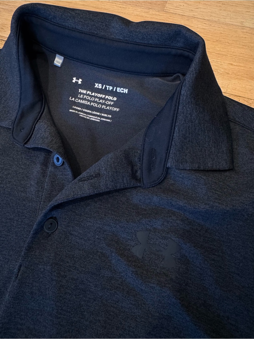 Under Armour men’s Black  Heather Polo Shirt, size XS